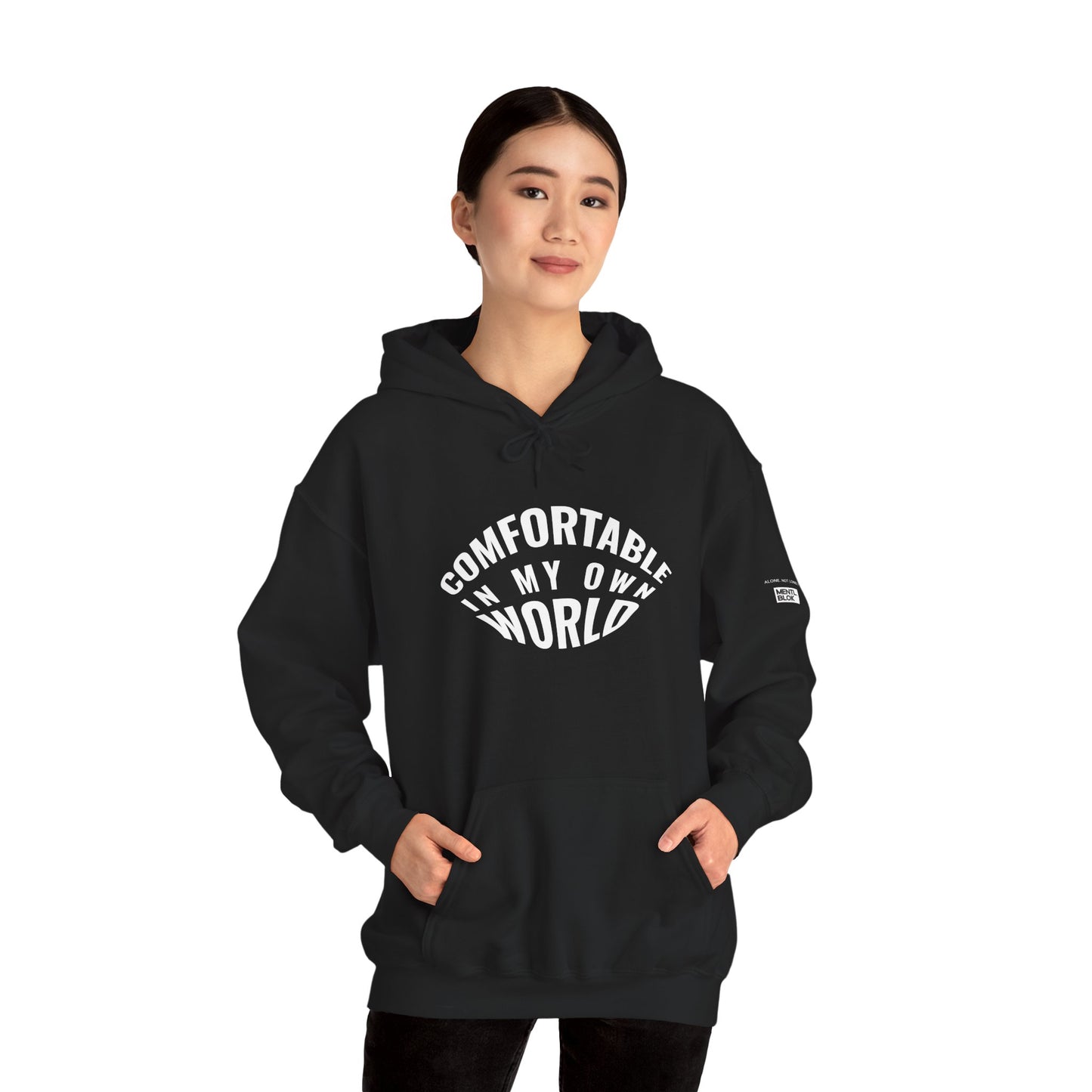 Person wearing a black hoodie with text on a white background