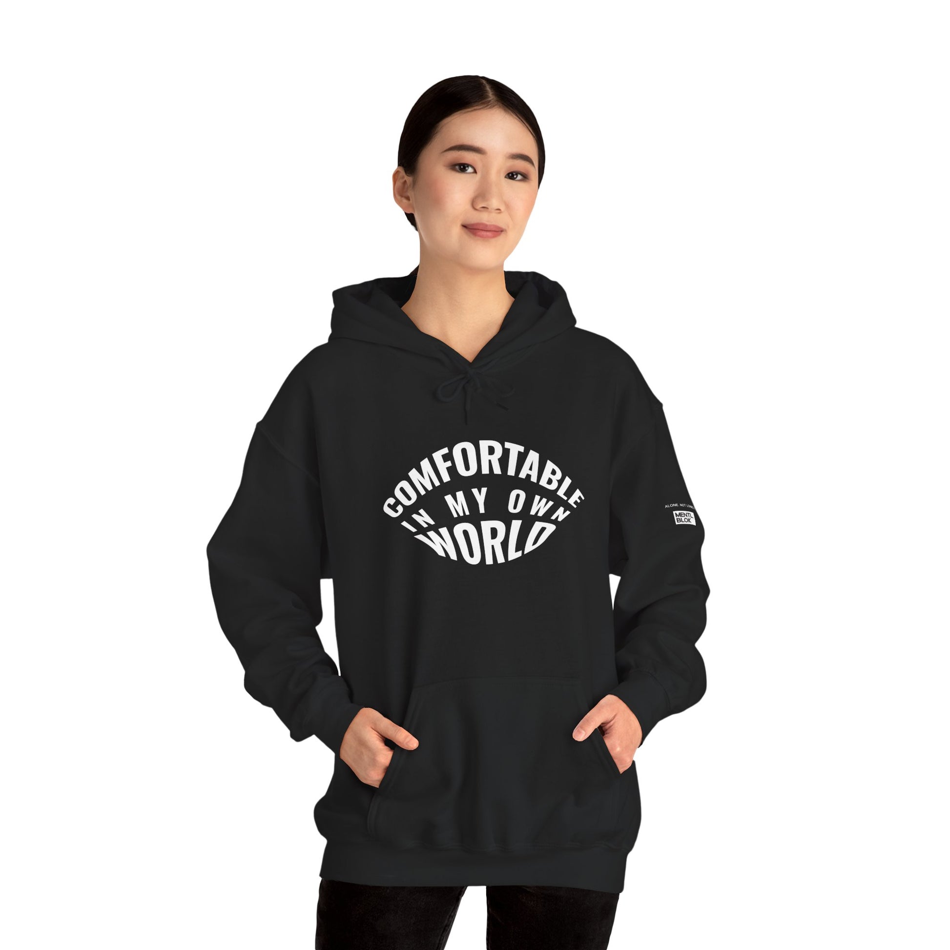 Person wearing a black hoodie with text on a white background