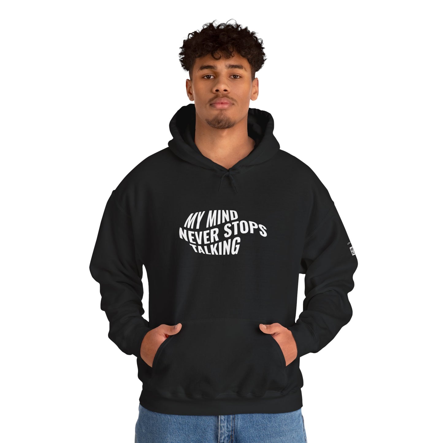 Person wearing a black hoodie with text on a white background