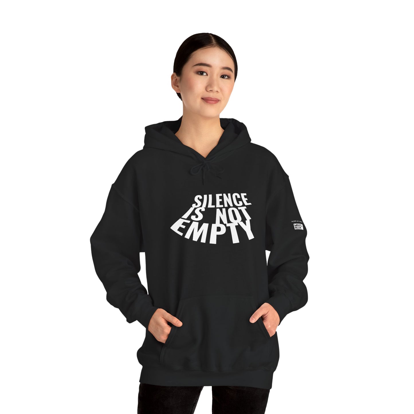 Person wearing a black hoodie with 'Silence is Not Empty' text on a white background